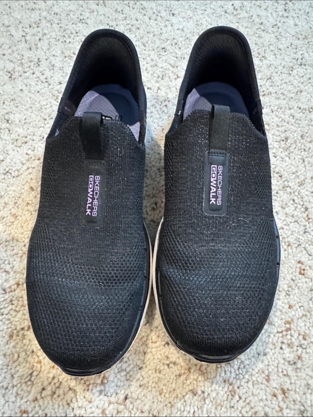 Skechers GOwalk Womens Slip-On Knit Sneakers in Black with Subtle Purple Accent